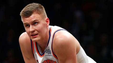 Write informative laconic excerpt under 30 words in mexican spanish for news below. Do not wrap it into quotation marks or html tags. Kristaps Porzingis tiene números impresionantes a lo largo de su carrera en la NBA. Porzingis ha promediado más de 20 puntos, 8 rebotes y 2 bloqueos por partido en varias temporadas. Sin embargo, las lesiones han sido un problema constante para Porzingis, lo que ha afectado su disponibilidad en la cancha. El jugador de baloncesto de la NBA, Kristaps Porzingis, ha tenido una carrera destacada con números impresionantes. Ha promediado más de 20 puntos, 8 rebotes y 2 bloqueos por partido en varias temporadas. Sin embargo, las lesiones han sido un problema constante para Porzingis, lo que ha afectado su disponibilidad en la cancha. A pesar de su talento y potencial, los gerentes de fantasy deben considerar el historial de lesiones de Porzingis al seleccionarlo en el draft.,Kristaps Porzingis, estrella en la NBA con brillantes estadísticas, pero plagado de lesiones que afectan su juego. Gerentes de fantasy deben considerar su historial al elegirlo.