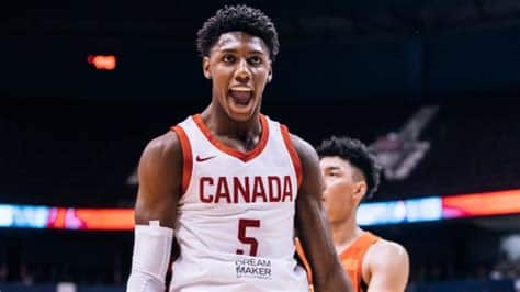 Write informative laconic excerpt under 30 words in mexican spanish for news below. Do not wrap it into quotation marks or html tags. RJ Barrett, jugador de los New York Knicks, ha tenido altibajos a lo largo de su carrera y necesita mejorar su eficiencia en el tiro. Barrett promedió 19.6 puntos, 5.0 rebotes y 2.8 asistencias por partido en la temporada 2022-23, pero tuvo problemas en su porcentaje de tiros de campo, triples y tiros libres. La adición de nuevos jugadores en el equipo de los Knicks podría afectar el rol de Barrett y disminuir su volumen de juego, por lo que necesitará demostrar su eficiencia en la próxima temporada.,Barrett, de los Knicks, necesita mejorar su eficiencia en el tiro tras altibajos en la temporada. Nuevos jugadores podrían impactar su rol.