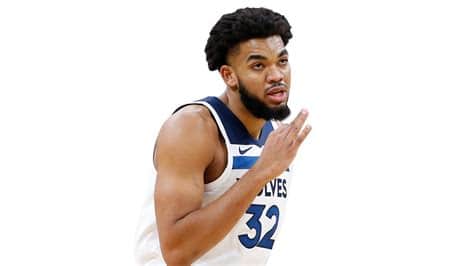 Write informative laconic excerpt under 30 words in mexican spanish for news below. Do not wrap it into quotation marks or html tags. Karl-Anthony Towns ha registrado promedios de dobles dobles en sus primeras seis temporadas, pero no ha logrado alcanzar esa marca en las últimas dos temporadas. Towns ha sufrido una disminución en su producción debido a las adiciones de Rudy Gobert y D'Angelo Russell en los Timberwolves, así como a lesiones que le han impedido jugar la temporada completa. A pesar de las lesiones y la disminución en sus números de rebotes, Towns se ha destacado como uno de los mejores centros de fantasía debido a su capacidad para anotar desde más allá del arco y su eficiencia en el tiro.,Karl-Anthony Towns, estrella de los Timberwolves, enfrenta desafíos con lesiones y competencia, pero aún destaca en fantasía por su versatilidad en la cancha.